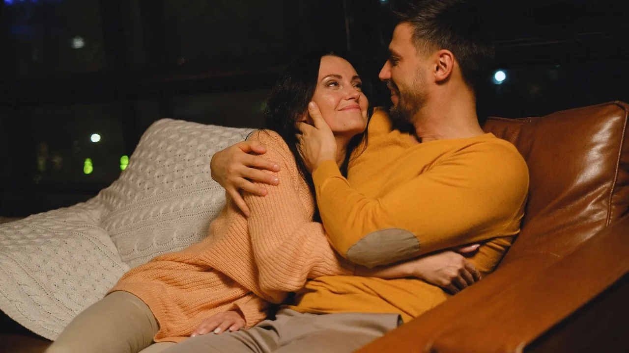 A couple in each other’s arms